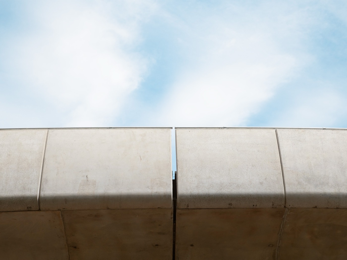 Upper storeys of a building against open sky